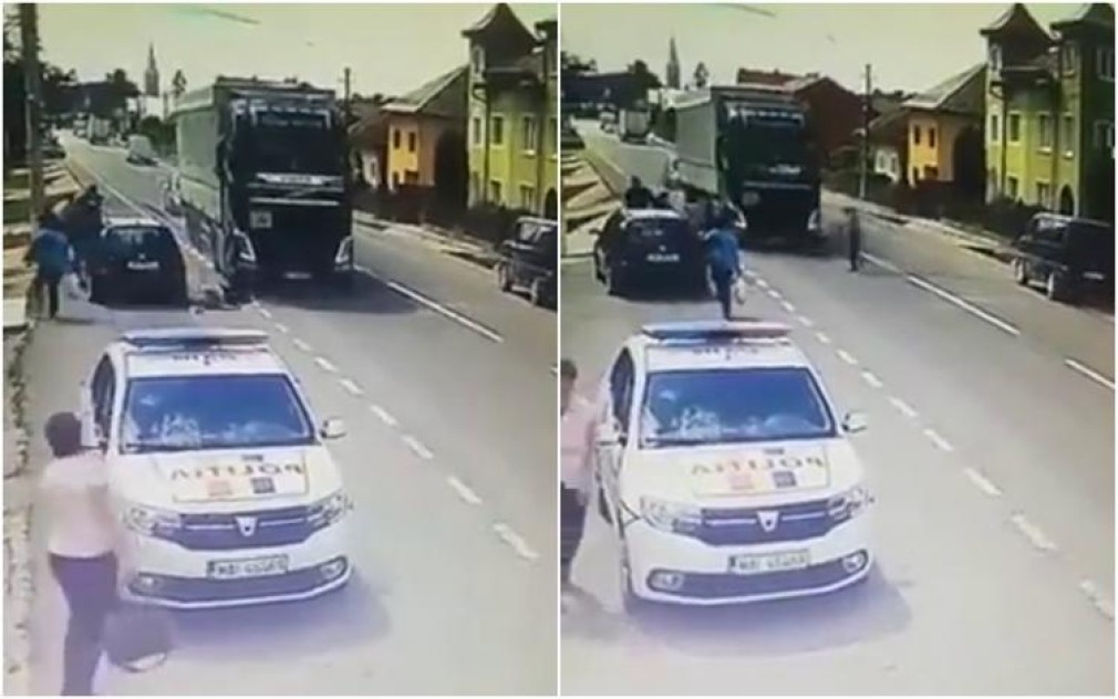 VIDEO Polițistă lovită de camion în timp ce traversa strada