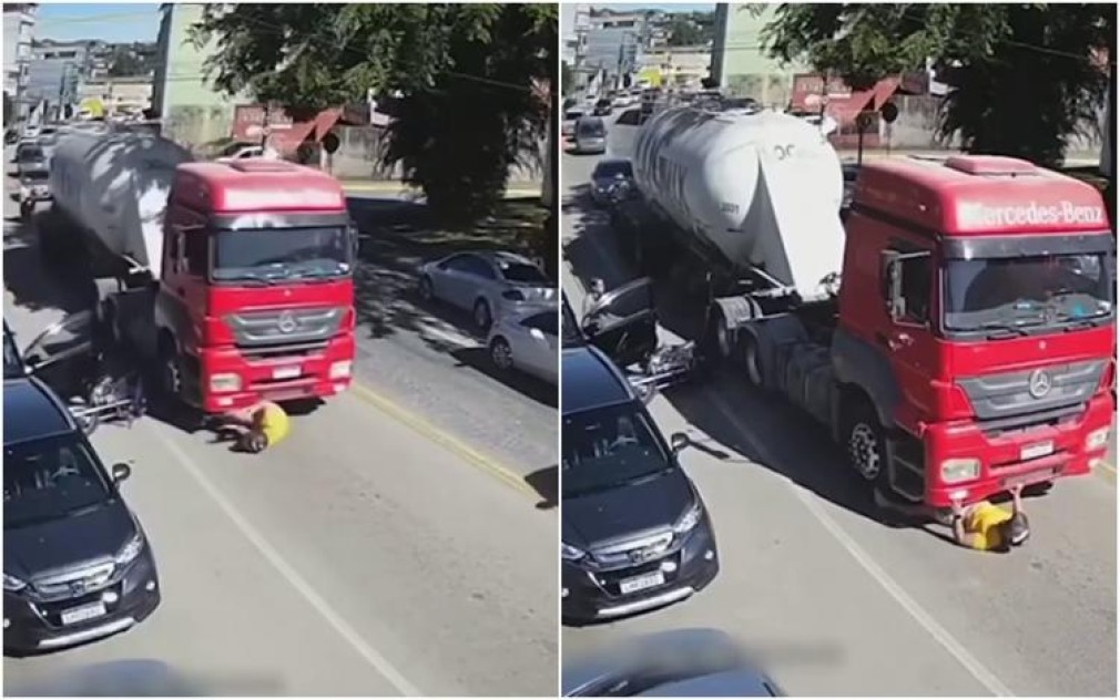 VIDEO. Motociclist aruncat de o portieră deschisă direct sub roțile camionului