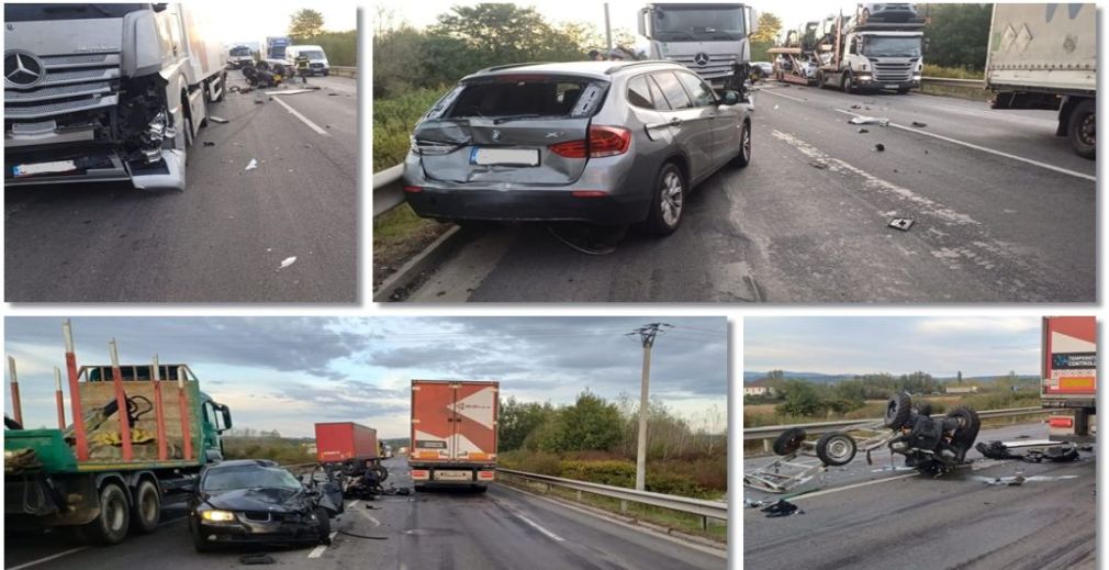 Remorca unui camion s-a răsturnat după impactul cu două mașini BMW