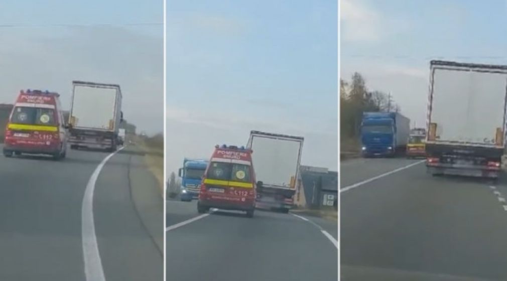 Ambulanță SMURD aflată în misiune, blocată să depășească un camion