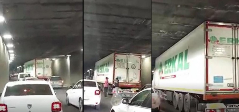 VIDEO. Camion, blocat în Pasajul Unirii din București. Drumarii au turnat asfalt și au înălțat prea mult carosabilul